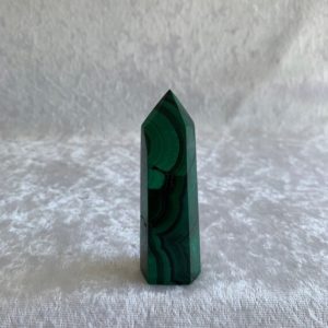 Shop Malachite Points & Wands! Malachite Point | Natural genuine stones & crystals in various shapes & sizes. Buy raw cut, tumbled, or polished gemstones for making jewelry or crystal healing energy vibration raising reiki stones. #crystals #gemstones #crystalhealing #crystalsandgemstones #energyhealing #affiliate #ad