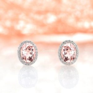 Shop Morganite Jewelry! Halo Oval Morganite Stud Earrings For Women- Sterling Silver Dainty Gemstone Earrings Hypoallergenic Anniversary Birthday Gift for Her | Natural genuine Morganite jewelry. Buy crystal jewelry, handmade handcrafted artisan jewelry for women.  Unique handmade gift ideas. #jewelry #beadedjewelry #beadedjewelry #gift #shopping #handmadejewelry #fashion #style #product #jewelry #affiliate #ad