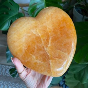 Shop Orange Calcite Shapes! XL orange calcite heart, extra gemmy | Natural genuine stones & crystals in various shapes & sizes. Buy raw cut, tumbled, or polished gemstones for making jewelry or crystal healing energy vibration raising reiki stones. #crystals #gemstones #crystalhealing #crystalsandgemstones #energyhealing #affiliate #ad