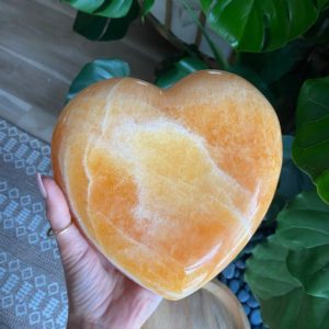 Shop Orange Calcite Shapes! XL orange calcite heart, extra gemmy | Natural genuine stones & crystals in various shapes & sizes. Buy raw cut, tumbled, or polished gemstones for making jewelry or crystal healing energy vibration raising reiki stones. #crystals #gemstones #crystalhealing #crystalsandgemstones #energyhealing #affiliate #ad