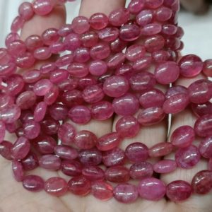 Shop Pink Sapphire Beads! 8 Inches Strands, Natural Pink Sapphire Smooth Oval Beads.size 7-10mm | Natural genuine other-shape Pink Sapphire beads for beading and jewelry making.  #jewelry #beads #beadedjewelry #diyjewelry #jewelrymaking #beadstore #beading #affiliate #ad