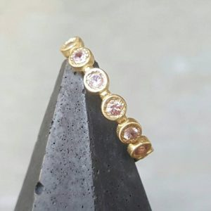 Shop Pink Sapphire Rings! Pink sapphire ring- pink sapphire stacking ring-multiple sapphire ring- half infinity sapphire ring- yellow gold sapphire ring | Natural genuine Pink Sapphire rings, simple unique handcrafted gemstone rings. #rings #jewelry #shopping #gift #handmade #fashion #style #affiliate #ad