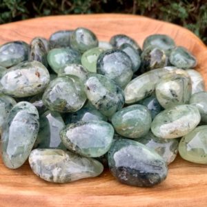 Shop Tumbled Prehnite Crystals & Pocket Stones! Prehnite Tumbled Stone | Natural genuine stones & crystals in various shapes & sizes. Buy raw cut, tumbled, or polished gemstones for making jewelry or crystal healing energy vibration raising reiki stones. #crystals #gemstones #crystalhealing #crystalsandgemstones #energyhealing #affiliate #ad