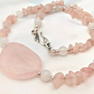 Shop Quartz Crystal Pendants! Rose and snow quartz statement necklace. Bold design with tumbled crystal pendant. Pink & white jewelry, Pantone color of the year 2016 | Natural genuine Quartz pendants. Buy crystal jewelry, handmade handcrafted artisan jewelry for women.  Unique handmade gift ideas. #jewelry #beadedpendants #beadedjewelry #gift #shopping #handmadejewelry #fashion #style #product #pendants #affiliate #ad