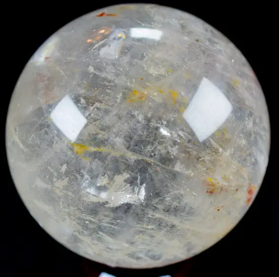 Clear Quartz Sphere With Iron Inclusion 3.4" In Diameter Weighs 2.07 Pounds