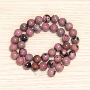 Natural Rhodonite Beads Round America Rhodonite Crystal Stone Bead Necklace Pink Quartz Gemstone Strand Wholsale Healing Crystal | Natural genuine Array jewelry. Buy crystal jewelry, handmade handcrafted artisan jewelry for women.  Unique handmade gift ideas. #jewelry #beadedjewelry #beadedjewelry #gift #shopping #handmadejewelry #fashion #style #product #jewelry #affiliate #ad