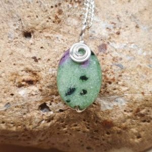Shop Ruby Zoisite Pendants! Ruby Zoisite pendant. Anyolite necklace.  Reiki jewelry uk. Aries jewelry. 18x12mm stone | Natural genuine Ruby Zoisite pendants. Buy crystal jewelry, handmade handcrafted artisan jewelry for women.  Unique handmade gift ideas. #jewelry #beadedpendants #beadedjewelry #gift #shopping #handmadejewelry #fashion #style #product #pendants #affiliate #ad