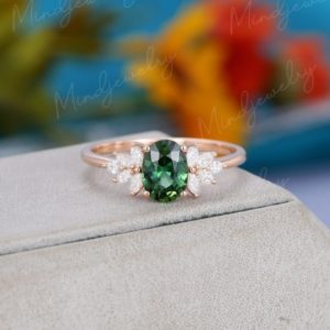Oval cut Blue green sapphire engagement ring Rose gold Unique Vintage ring Cluster marquise diamond wedding Bridal Promise gift  for women | Natural genuine Gemstone rings, simple unique alternative gemstone engagement rings. #rings #jewelry #bridal #wedding #jewelryaccessories #engagementrings #weddingideas #affiliate #ad