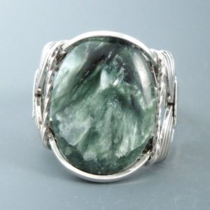 Shop Seraphinite Rings! Sterling Silver Seraphinite Cabochon Wire Wrapped  Ring | Natural genuine Seraphinite rings, simple unique handcrafted gemstone rings. #rings #jewelry #shopping #gift #handmade #fashion #style #affiliate #ad