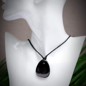Shop Shungite Jewelry! Shungite EMF 5G Protection 1.5-2in Flat Tumble Pebble Pendant Front Hole Black Cotton Wax Cord Genuine Leather Slip Knot Adjustable Necklace | Natural genuine Shungite jewelry. Buy crystal jewelry, handmade handcrafted artisan jewelry for women.  Unique handmade gift ideas. #jewelry #beadedjewelry #beadedjewelry #gift #shopping #handmadejewelry #fashion #style #product #jewelry #affiliate #ad