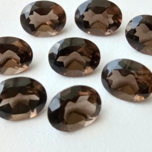 Shop Smoky Quartz Shapes! 10 Pcs Smoky Quartz Oval Cut Stone, Natural Smoky Quartz Oval Cut Loose Gemstone For Jewelry, Brown Stone (4x6mm To 9x11mm Option) | Natural genuine stones & crystals in various shapes & sizes. Buy raw cut, tumbled, or polished gemstones for making jewelry or crystal healing energy vibration raising reiki stones. #crystals #gemstones #crystalhealing #crystalsandgemstones #energyhealing #affiliate #ad
