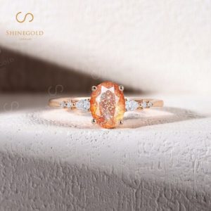 Shop Sunstone Rings! Vintage African Sunstone engagement ring Rose gold Oval cut prong set wedding ring Bridal unique ring Art deco Anniversary Promise ring | Natural genuine Sunstone rings, simple unique alternative gemstone engagement rings. #rings #jewelry #bridal #wedding #jewelryaccessories #engagementrings #weddingideas #affiliate #ad
