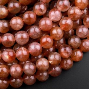 Shop Sunstone Round Beads! AAA Fiery Natural Sunstone Round Beads 4mm 6mm 8mm 10mm Feldspar Golden Glitters Orange Gemstone 15.5" Strand | Natural genuine round Sunstone beads for beading and jewelry making.  #jewelry #beads #beadedjewelry #diyjewelry #jewelrymaking #beadstore #beading #affiliate #ad