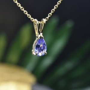 Shop Tanzanite Pendants! Natural Tanzanite Pendant in 14kt Solid Gold, Ready to ship, December birthstone, Tanzanite necklace, Dainty Tanzanite pendant, Gift for her | Natural genuine Tanzanite pendants. Buy crystal jewelry, handmade handcrafted artisan jewelry for women.  Unique handmade gift ideas. #jewelry #beadedpendants #beadedjewelry #gift #shopping #handmadejewelry #fashion #style #product #pendants #affiliate #ad
