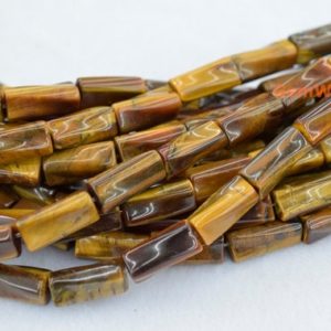 Shop Tiger Eye Bead Shapes! 15.5" 9x20mm Yellow tiger eye twisted Tube/column beads , Natural gemstone/semi precious stone JGDOT | Natural genuine other-shape Tiger Eye beads for beading and jewelry making.  #jewelry #beads #beadedjewelry #diyjewelry #jewelrymaking #beadstore #beading #affiliate #ad