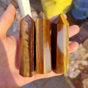 Shop Tiger Eye Points & Wands! Tiger's EyePoint 5 pcs or 10 pcs Bulk Natural Tiger Eye Tower Gemstone Obelisk Wholesale | Natural genuine stones & crystals in various shapes & sizes. Buy raw cut, tumbled, or polished gemstones for making jewelry or crystal healing energy vibration raising reiki stones. #crystals #gemstones #crystalhealing #crystalsandgemstones #energyhealing #affiliate #ad