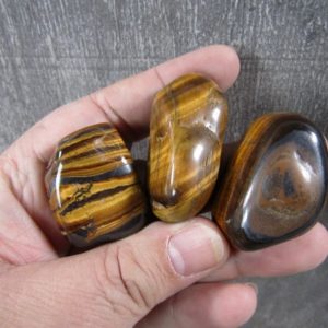 Shop Tumbled Tiger Eye Crystals & Pocket Stones! Tiger's Eye Tumbled Stone 1 inch + T301 | Natural genuine stones & crystals in various shapes & sizes. Buy raw cut, tumbled, or polished gemstones for making jewelry or crystal healing energy vibration raising reiki stones. #crystals #gemstones #crystalhealing #crystalsandgemstones #energyhealing #affiliate #ad