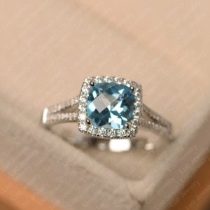 Swiss blue topaz ring, sterling silver, engagement ring for women, cushion cut blue stone ring | Natural genuine Gemstone rings, simple unique alternative gemstone engagement rings. #rings #jewelry #bridal #wedding #jewelryaccessories #engagementrings #weddingideas #affiliate #ad