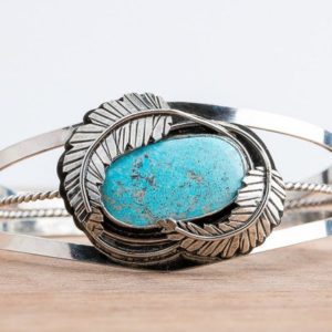 Shop Turquoise Bracelets! Blue Ridge Lightning Turquoise Cuff Bracelet With Feathers | Huge One Of A Kind Sterling Silver Aqua Blue Bohemian Boho Indian Navajo Cuff | Natural genuine Turquoise bracelets. Buy crystal jewelry, handmade handcrafted artisan jewelry for women.  Unique handmade gift ideas. #jewelry #beadedbracelets #beadedjewelry #gift #shopping #handmadejewelry #fashion #style #product #bracelets #affiliate #ad