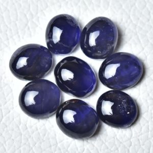 Shop Iolite Cabochons! 4 Pieces Natural Iolite Cabochons Lot 8.5x10mm Oval Shape Genuine Blue Iolite Cabs Gems loose Cabochon Gemstones Smooth Stones Cab C-5073 | Natural genuine stones & crystals in various shapes & sizes. Buy raw cut, tumbled, or polished gemstones for making jewelry or crystal healing energy vibration raising reiki stones. #crystals #gemstones #crystalhealing #crystalsandgemstones #energyhealing #affiliate #ad