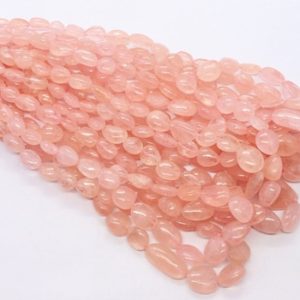 Shop Morganite Chip & Nugget Beads! AAA Quality Morganite smooth oval nuggets beads, 16" strand Morganite gemstone beads, Morganite plain beads, Morganite oval beads strand | Natural genuine chip Morganite beads for beading and jewelry making.  #jewelry #beads #beadedjewelry #diyjewelry #jewelrymaking #beadstore #beading #affiliate #ad