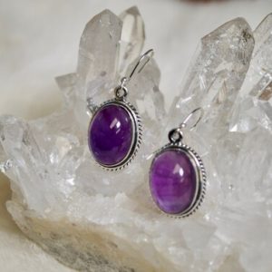 Shop Amethyst Earrings! Delicate Rope Detailed Oval Amethyst Dangle Earrings // Amethyst Jewelry // Metaphysical Jewelry // Sterling Silver // Village Silversmith | Natural genuine Amethyst earrings. Buy crystal jewelry, handmade handcrafted artisan jewelry for women.  Unique handmade gift ideas. #jewelry #beadedearrings #beadedjewelry #gift #shopping #handmadejewelry #fashion #style #product #earrings #affiliate #ad