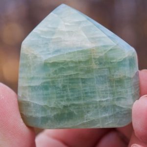 Shop Aquamarine Points & Wands! Aquamarine Wand from Angola | Natural genuine stones & crystals in various shapes & sizes. Buy raw cut, tumbled, or polished gemstones for making jewelry or crystal healing energy vibration raising reiki stones. #crystals #gemstones #crystalhealing #crystalsandgemstones #energyhealing #affiliate #ad