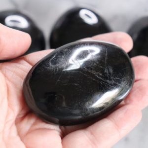 Shop Black Tourmaline Shapes! Black Tourmaline Palm Stone | Natural genuine stones & crystals in various shapes & sizes. Buy raw cut, tumbled, or polished gemstones for making jewelry or crystal healing energy vibration raising reiki stones. #crystals #gemstones #crystalhealing #crystalsandgemstones #energyhealing #affiliate #ad