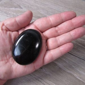 Black Tourmaline Palm Stone 2 inch + Fig 523 | Natural genuine stones & crystals in various shapes & sizes. Buy raw cut, tumbled, or polished gemstones for making jewelry or crystal healing energy vibration raising reiki stones. #crystals #gemstones #crystalhealing #crystalsandgemstones #energyhealing #affiliate #ad