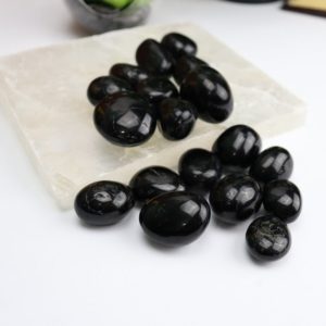 Shop Tumbled Black Tourmaline Crystals & Pocket Stones! Black Tourmaline Tumble | Black Tourmaline Tumbled | Black Tourmaline Tumbles | Natural genuine stones & crystals in various shapes & sizes. Buy raw cut, tumbled, or polished gemstones for making jewelry or crystal healing energy vibration raising reiki stones. #crystals #gemstones #crystalhealing #crystalsandgemstones #energyhealing #affiliate #ad