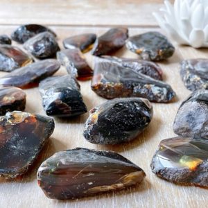 Shop Raw & Rough Amber Stones! Blue Amber Raw & Polished | Natural genuine stones & crystals in various shapes & sizes. Buy raw cut, tumbled, or polished gemstones for making jewelry or crystal healing energy vibration raising reiki stones. #crystals #gemstones #crystalhealing #crystalsandgemstones #energyhealing #affiliate #ad