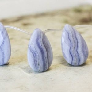 Shop Blue Lace Agate Bead Shapes! XL/ Blue Lace agate 23x38mm Flat Pear Briolette Beads 8" Strand 6pcs Natural Light Blue Banded Agate Fine Cut Pear Drop For Jewelry Making | Natural genuine other-shape Blue Lace Agate beads for beading and jewelry making.  #jewelry #beads #beadedjewelry #diyjewelry #jewelrymaking #beadstore #beading #affiliate #ad