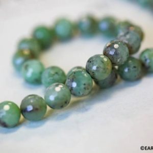 Shop Chrysoprase Faceted Beads! M/ Chrysoprase 10mm Faceted Round beads 15.5" strand Natural green gemstone beads For jewelry making | Natural genuine faceted Chrysoprase beads for beading and jewelry making.  #jewelry #beads #beadedjewelry #diyjewelry #jewelrymaking #beadstore #beading #affiliate #ad