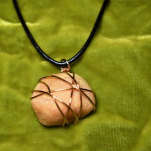 Shop Orange Calcite Pendants! Copper Wire-Wrapped Orange Calcite Crystal Necklace with Black Leather Corded Chain | Natural genuine Orange Calcite pendants. Buy crystal jewelry, handmade handcrafted artisan jewelry for women.  Unique handmade gift ideas. #jewelry #beadedpendants #beadedjewelry #gift #shopping #handmadejewelry #fashion #style #product #pendants #affiliate #ad