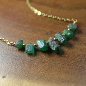 Shop Emerald Necklaces! Raw Emerald Necklace In 14k Gold, Sterling Silver / / May Birthstone / / 20th, 35th Anniversary / / Healing Crystal Necklace / / Heart Chakra | Natural genuine Emerald necklaces. Buy crystal jewelry, handmade handcrafted artisan jewelry for women.  Unique handmade gift ideas. #jewelry #beadednecklaces #beadedjewelry #gift #shopping #handmadejewelry #fashion #style #product #necklaces #affiliate #ad