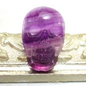 Skull Cabochon Purple Fluorite Carved One of a kind Unique Unisex Jewelry Rocker Biker Masculine Jewelry Day of the Dead Halloween Carving | Natural genuine stones & crystals in various shapes & sizes. Buy raw cut, tumbled, or polished gemstones for making jewelry or crystal healing energy vibration raising reiki stones. #crystals #gemstones #crystalhealing #crystalsandgemstones #energyhealing #affiliate #ad