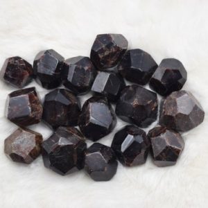 Shop Raw & Rough Garnet Stones! Garnet Dodecahedron // Garnet Specimen // Garnet mineral // Garnet // January Birthstone  // Village Silversmith | Natural genuine stones & crystals in various shapes & sizes. Buy raw cut, tumbled, or polished gemstones for making jewelry or crystal healing energy vibration raising reiki stones. #crystals #gemstones #crystalhealing #crystalsandgemstones #energyhealing #affiliate #ad