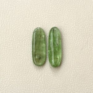 Shop Kyanite Cabochons! 2 Pcs Green Kyanite Cabochon Loose Gemstones, Elongated Oval Shape – 30x10mm ca., 31.32ct | Natural genuine stones & crystals in various shapes & sizes. Buy raw cut, tumbled, or polished gemstones for making jewelry or crystal healing energy vibration raising reiki stones. #crystals #gemstones #crystalhealing #crystalsandgemstones #energyhealing #affiliate #ad