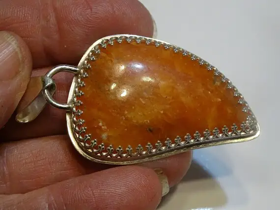 Handmade Orance Calcite Pendant..set In Sterling Silver With 18" Sterling Silver Chain..bright Color .. 25 X 16mm..really Nice Stone!