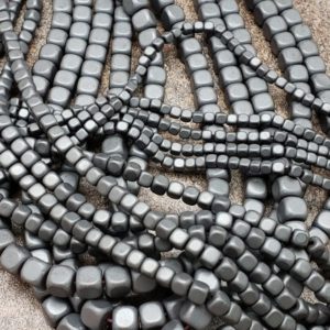 Shop Hematite Stones & Crystals! 2mm or 3mm or 4mm or 6mm Hematite 3D Cubes, Matte Finish with Smoothed Edges, 15.5 inch | Natural genuine stones & crystals in various shapes & sizes. Buy raw cut, tumbled, or polished gemstones for making jewelry or crystal healing energy vibration raising reiki stones. #crystals #gemstones #crystalhealing #crystalsandgemstones #energyhealing #affiliate #ad