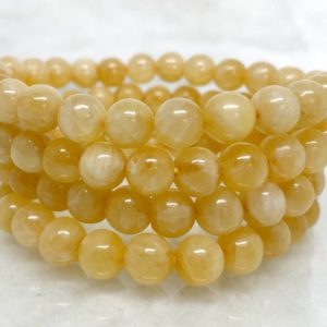Shop Orange Calcite Jewelry! Honey Calcite Bracelet 4mm, 6mm, 8mm, 10mm  A Round Beaded Bracelet Orange Calcite Gemstone Healing Bracelet Calcite Stone Bracelet | Natural genuine Orange Calcite jewelry. Buy crystal jewelry, handmade handcrafted artisan jewelry for women.  Unique handmade gift ideas. #jewelry #beadedjewelry #beadedjewelry #gift #shopping #handmadejewelry #fashion #style #product #jewelry #affiliate #ad