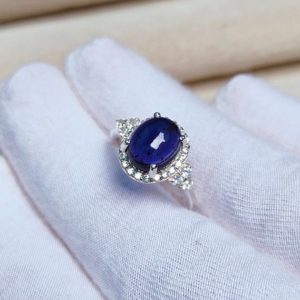 Shop Iolite Rings! Natural iolite halo ring, oval iolite ring, iolite cabochon ring, 925 sterling silver ring, oval iolite cabochon ring, hand made ring | Natural genuine Iolite rings, simple unique handcrafted gemstone rings. #rings #jewelry #shopping #gift #handmade #fashion #style #affiliate #ad