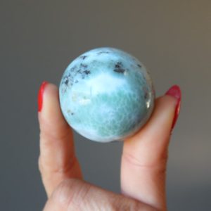 Shop Larimar Shapes! Larimar Sphere Tropical Paradise Happy Sea Green Crystal Ball | Natural genuine stones & crystals in various shapes & sizes. Buy raw cut, tumbled, or polished gemstones for making jewelry or crystal healing energy vibration raising reiki stones. #crystals #gemstones #crystalhealing #crystalsandgemstones #energyhealing #affiliate #ad