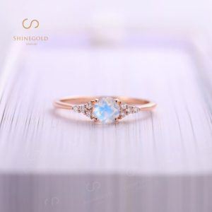 Shop Moonstone Jewelry! Oval moonstone engagement ring vintage rose gold ring Diamond moissanite cluster ring Art deco engagement ring women Bridal Anniversary ring | Natural genuine Moonstone jewelry. Buy handcrafted artisan wedding jewelry.  Unique handmade bridal jewelry gift ideas. #jewelry #beadedjewelry #gift #crystaljewelry #shopping #handmadejewelry #wedding #bridal #jewelry #affiliate #ad