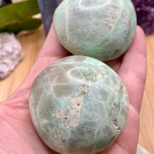 Shop Moonstone Shapes! Gorgeous Green Moonstone or Garnierite palm stone crystal geode healing gem | Natural genuine stones & crystals in various shapes & sizes. Buy raw cut, tumbled, or polished gemstones for making jewelry or crystal healing energy vibration raising reiki stones. #crystals #gemstones #crystalhealing #crystalsandgemstones #energyhealing #affiliate #ad