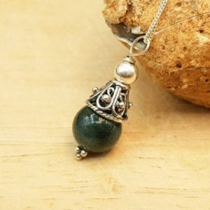 Shop Moss Agate Pendants! Small minimalist Moss agate cone pendant necklace. 10mm Green Crystal Reiki jewelry uk. Virgo jewelry. Bali silver necklaces for women. | Natural genuine Moss Agate pendants. Buy crystal jewelry, handmade handcrafted artisan jewelry for women.  Unique handmade gift ideas. #jewelry #beadedpendants #beadedjewelry #gift #shopping #handmadejewelry #fashion #style #product #pendants #affiliate #ad