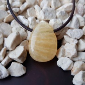 Shop Orange Calcite Necklaces! Halskette Orangencalcit Anhänger mit Leder- oder Baumwollband – Trommelstein | Natural genuine Orange Calcite necklaces. Buy crystal jewelry, handmade handcrafted artisan jewelry for women.  Unique handmade gift ideas. #jewelry #beadednecklaces #beadedjewelry #gift #shopping #handmadejewelry #fashion #style #product #necklaces #affiliate #ad