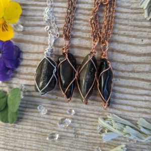 Shop Obsidian Pendants! Small sheen Obsidian crystal pendant, sheen Obsidian necklace, natural silver sheen Obsidian crystal necklace, black and silver copper silv | Natural genuine Obsidian pendants. Buy crystal jewelry, handmade handcrafted artisan jewelry for women.  Unique handmade gift ideas. #jewelry #beadedpendants #beadedjewelry #gift #shopping #handmadejewelry #fashion #style #product #pendants #affiliate #ad