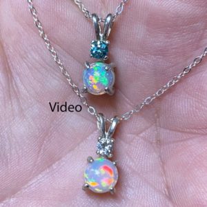 Shop Opal Necklaces! Moissanite & Natural Ethiopian Fire Opal Necklace/ Moissanite Accent / Sterling Silver/ AAA 6.00mm Round Rainbow Play Ethiopian Fire Opal | Natural genuine Opal necklaces. Buy crystal jewelry, handmade handcrafted artisan jewelry for women.  Unique handmade gift ideas. #jewelry #beadednecklaces #beadedjewelry #gift #shopping #handmadejewelry #fashion #style #product #necklaces #affiliate #ad