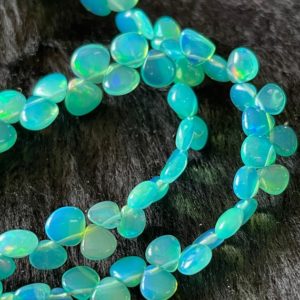 Shop Opal Bead Shapes! 4mm To 7mm Ethiopian Opal Blue Smooth Heart Shaped Briolette Beads, Natural Blue Opal Loose Gemstone Beads, Sold As 16 Inch Strand, GDS2141 | Natural genuine other-shape Opal beads for beading and jewelry making.  #jewelry #beads #beadedjewelry #diyjewelry #jewelrymaking #beadstore #beading #affiliate #ad